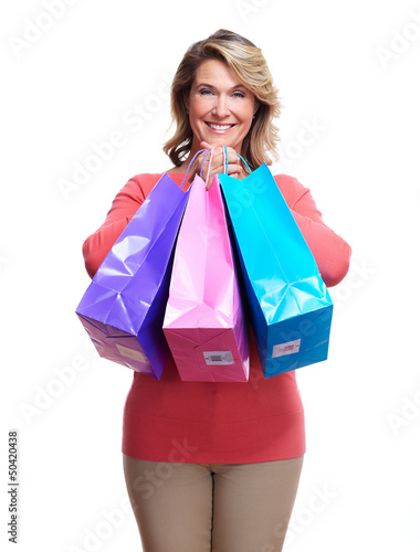 Photo: Senior woman with shopping bags. Senior woman with shopping bags.