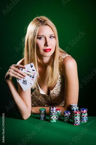 Photo: Woman in casino playing cards Woman in casino playing cards