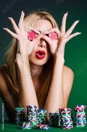 Photo: Woman in casino playing cards Woman in casino playing cards