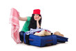 Young girl packing for vacation