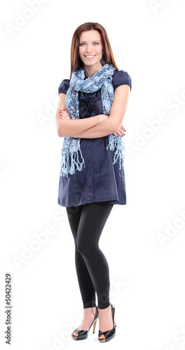 Photo: Full length portrait of a pretty young woman posing Full length portrait of a pretty young woman posing