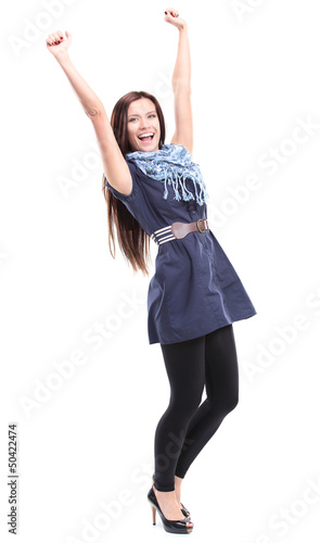 Photo: Successful business woman celebrating - isolated Successful business woman celebrating - isolated