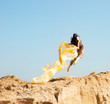 Beautiful young woman jumping