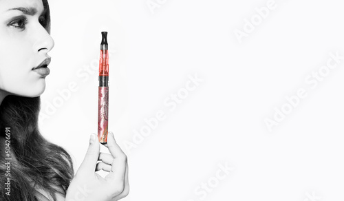 Photo: Sexy woman holding an ecigarette Sexy woman holding an ecigarette