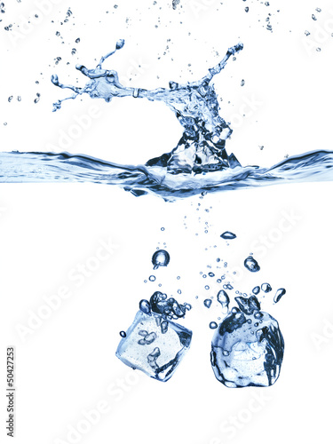 Photo: ice cubes splash in water isolated on white ice cubes splash in water isolated on white