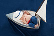 Newborn Baby Boy Sailor Sleeping in a Boat