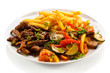 Grilled meat with French fries and vegetables