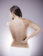 Woman massaging pain back