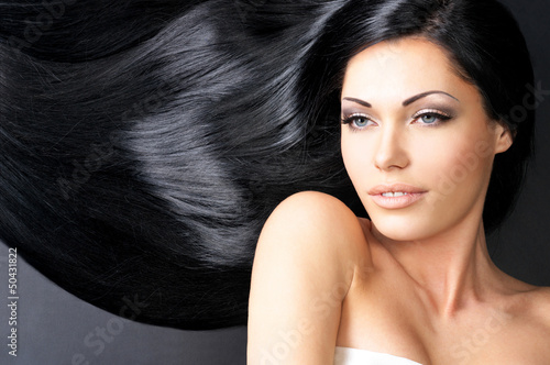 Photo: Beautiful woman with long straight hair Beautiful woman with long straight hair
