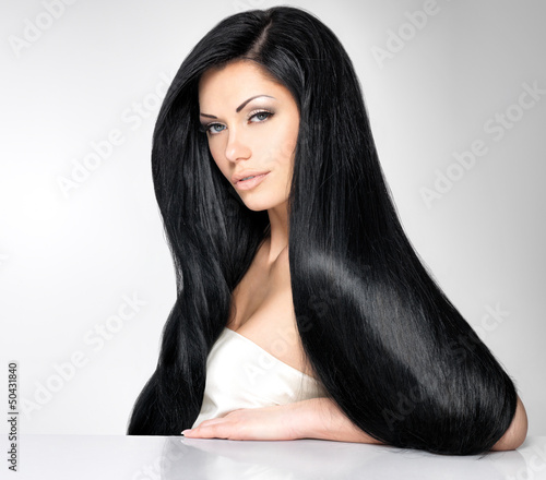 Photo: Beautiful woman with long straight hair Beautiful woman with long straight hair