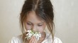 Video: little girl smelling spring flowers little girl smelling spring flowers