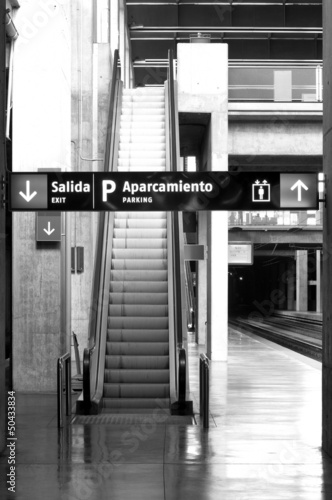 Photo: Railway station with signposting and escalators Railway station with signposting and escalators