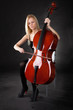 Beautiful young woman playing cello