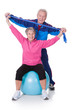 Portrait Of A Senior Couple Exercising