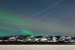 Star trails and Northern lights in moon lit night