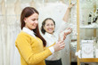 woman  chooses bridal accessories