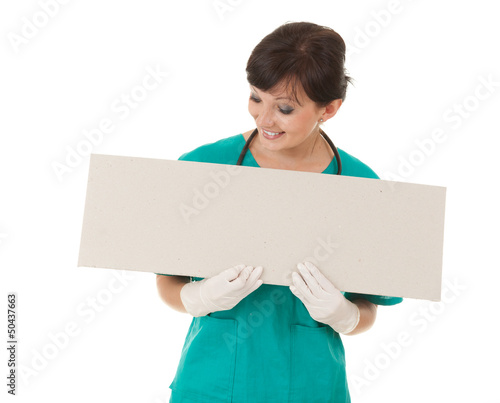 Photo: healthcare worker woman with empty board healthcare worker woman with empty board
