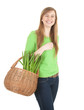 cheerful shopping girl with wicker basket