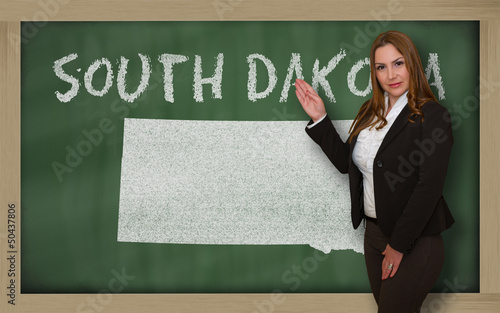 Photo: Teacher showing map of south dakota on blackboard Teacher showing map of south dakota on blackboard