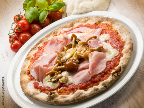 Photo: pizza with ham and mushroom pizza with ham and mushroom