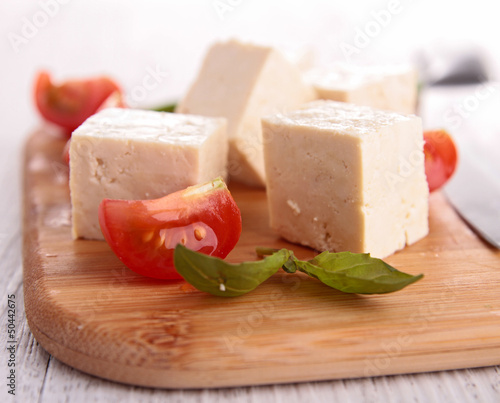 Photo: tofu with tomatoes on board tofu with tomatoes on board