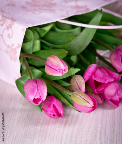Photo: Pink tulips in a pink bag Pink tulips in a pink bag