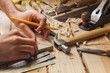 carpenter working,hammer and meter on construction background