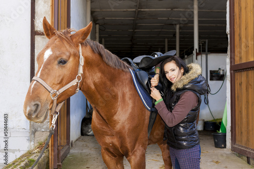 Photo: equestrian with her horse equestrian with her horse