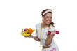 Junge Frau mit Obst und Hantel in der Hand