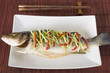 Chinese style steamed sea bass with ginger, chili & spring onion