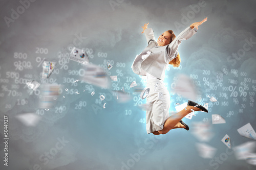 Photo: Image of jumping businesswoman Image of jumping businesswoman