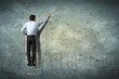 businessman drawing diagram