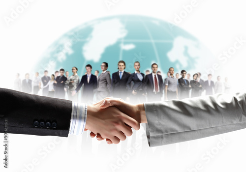 Photo: image of business handshake image of business handshake