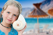 Summer joy - portrait of  lovely girl with seashell at the beach