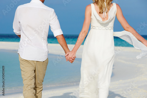 Photo: Couple At Beautiful Beach Wedding Couple At Beautiful Beach Wedding