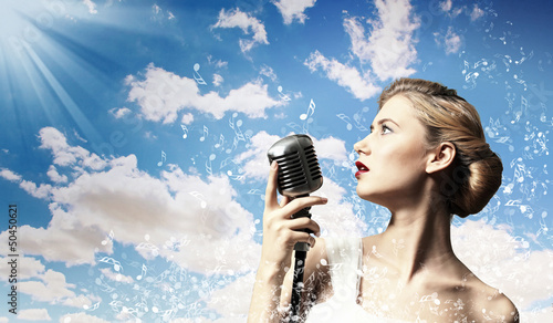 Photo: Female blonde singer Female blonde singer