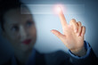 Business woman touching display