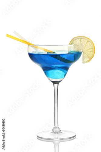 Photo: Blue cocktail in glass isolated on white Blue cocktail in glass isolated on white
