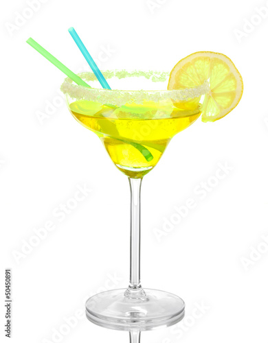 Photo: Yellow cocktail in glass on color background Yellow cocktail in glass on color background
