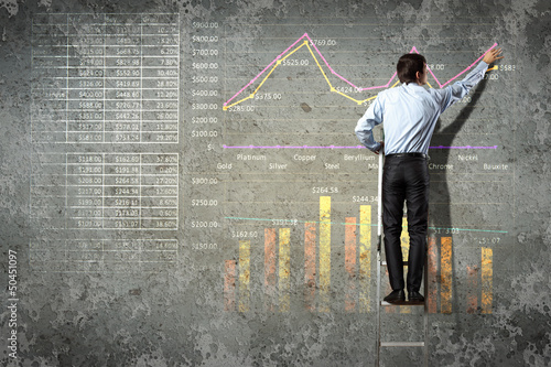 Photo: businessman drawing diagram businessman drawing diagram