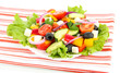 Tasty Greek salad isolated on white