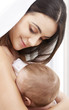 happy mother with baby at home