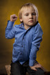 boy threatens a fist