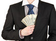 Business man hiding money in pocket isolated on white