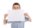 smiled boy with blank sheet paper