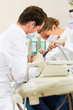 Patient with Dentist - dental treatment