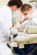 Patient with Dentist - dental treatment