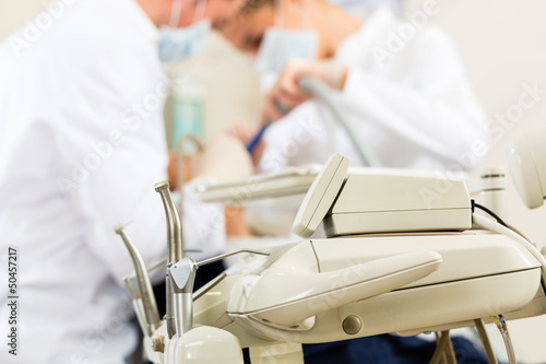 Photo: Patient with Dentist - dental treatment Patient with Dentist - dental treatment