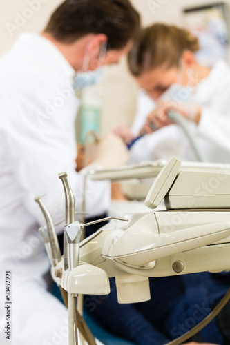 Photo: Patient with Dentist - dental treatment Patient with Dentist - dental treatment