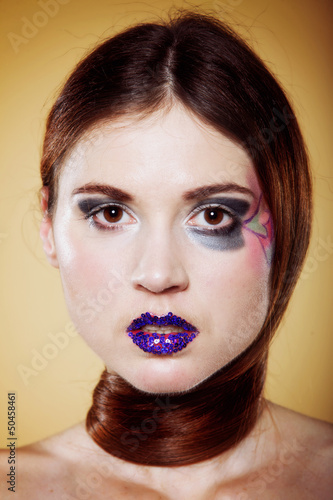 Photo: portrait of young beautiful woman creative make up portrait of young beautiful woman creative make up